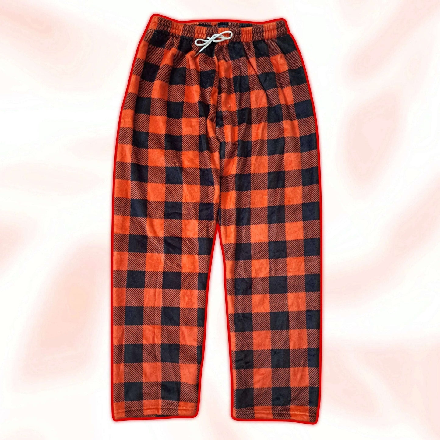 Red and black plaid pajama pants with elastic drawstring waist.