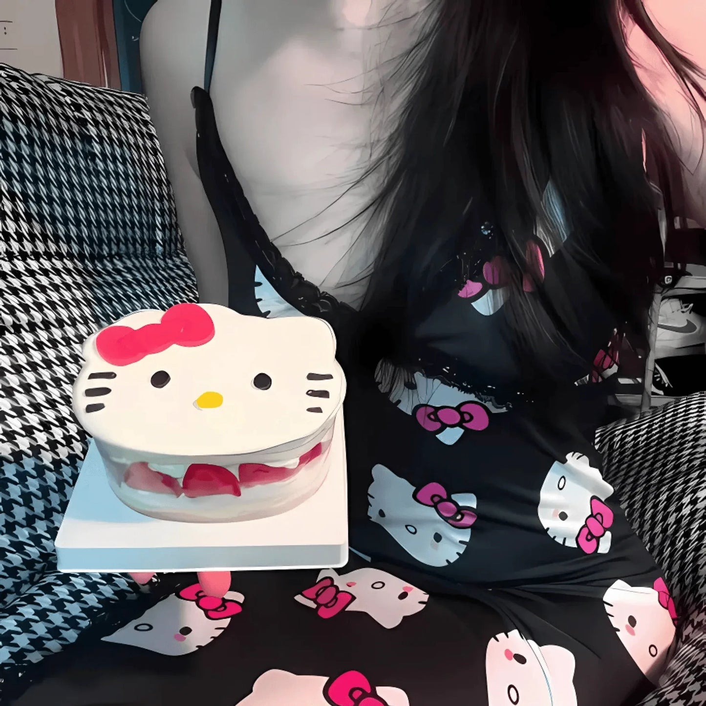 Black Hello Kitty nightdress with spaghetti straps and pink bow Hello Kitty print