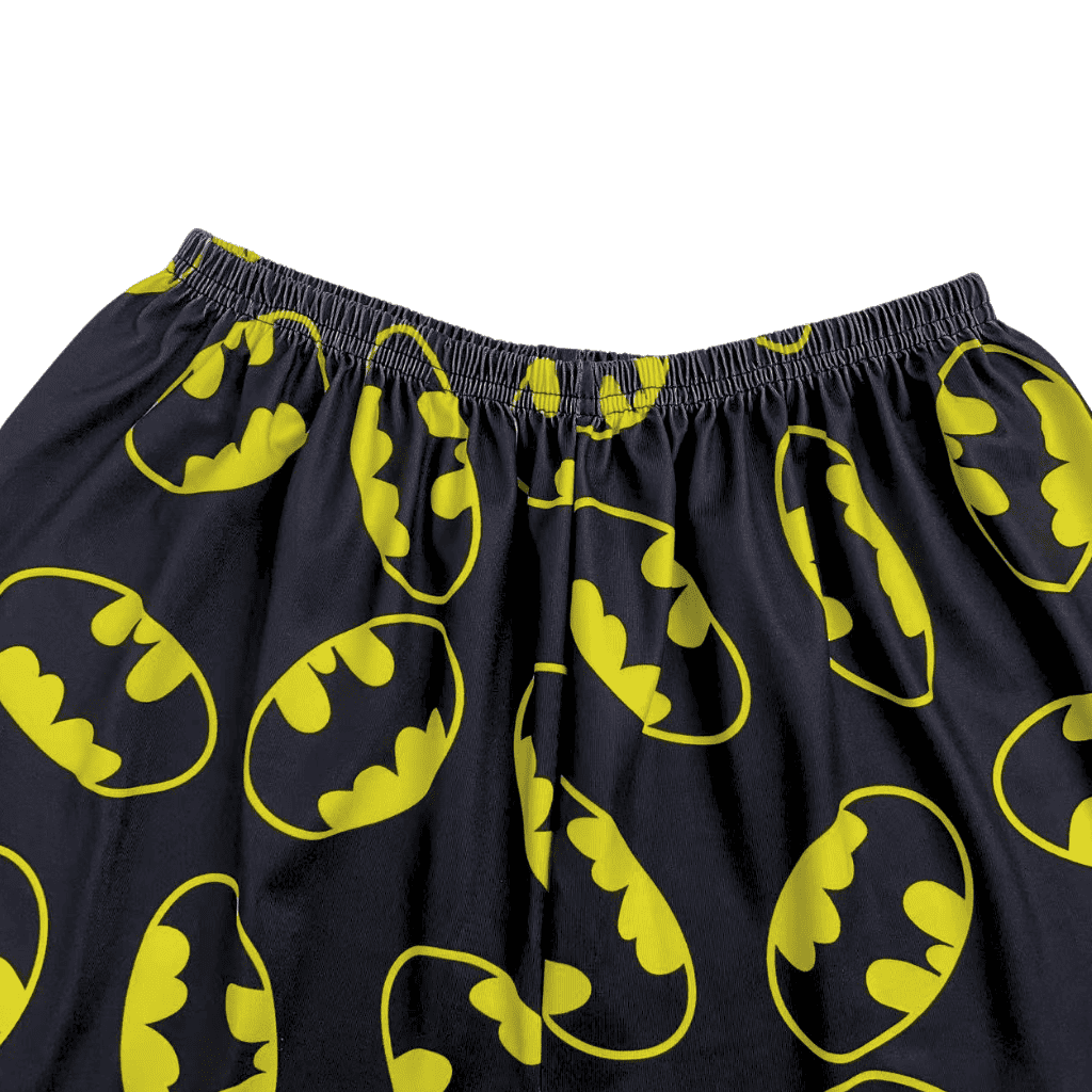 Thin Batman pajama pants, black fabric with scattered neon yellow bat prints