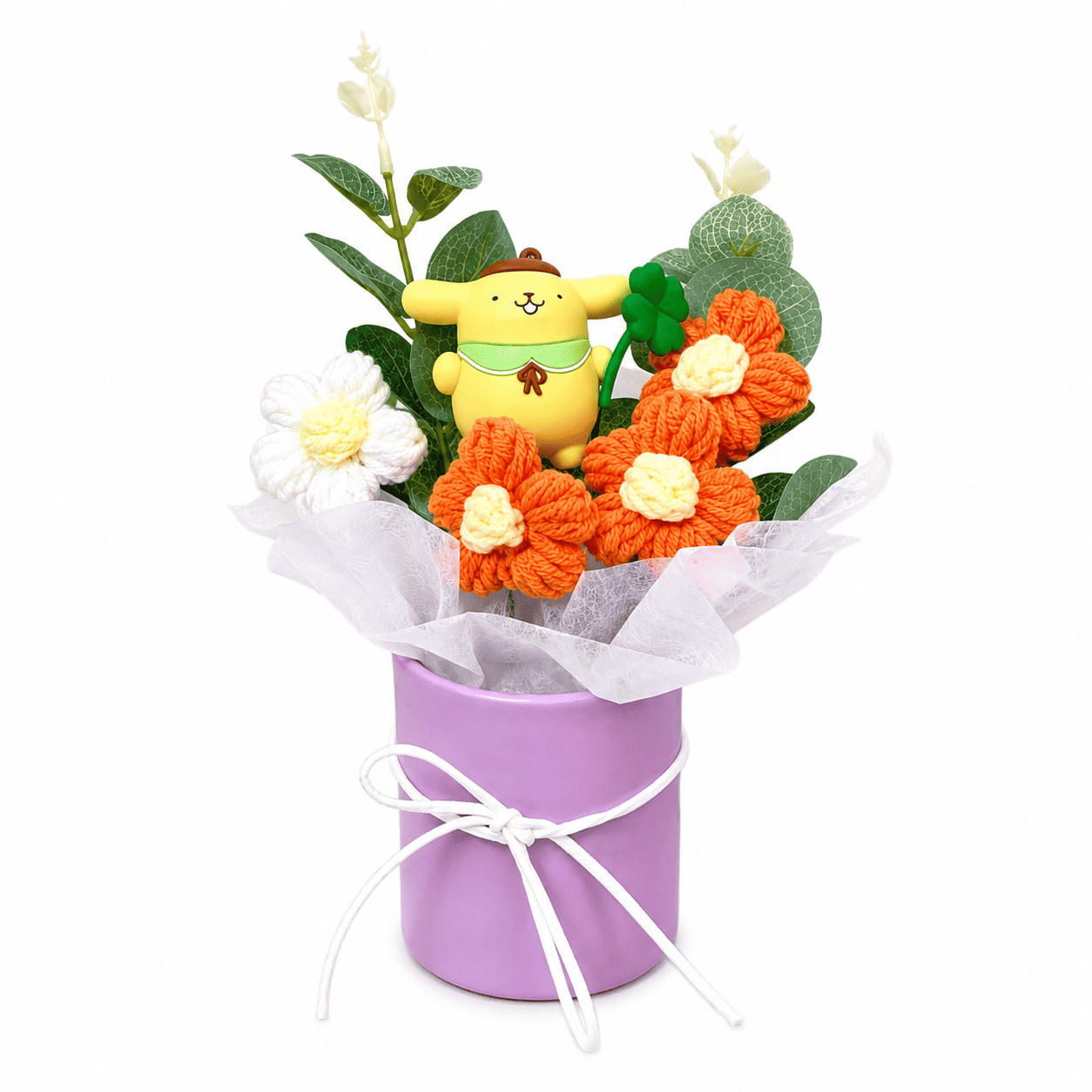 Pompompurin crochet flower bouquet with orange and white blooms in a purple box