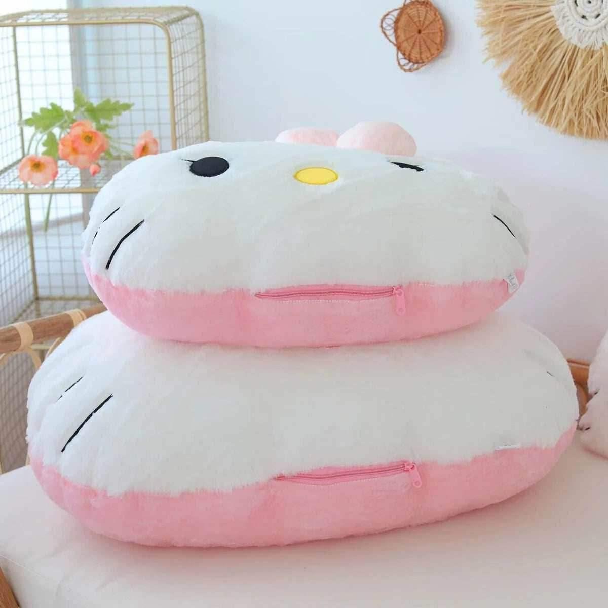 Hello Kitty face plush pillows, white with yellow nose and pink bottom layer