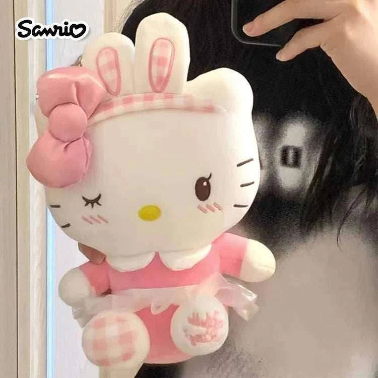 Hello Kitty bunny charm plush with pink bow ears, checkered headband, pink dress