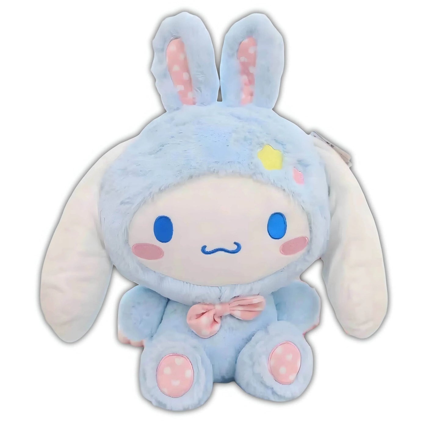 Light blue bunny plushie with smiling face, pink bow, and long floppy ears