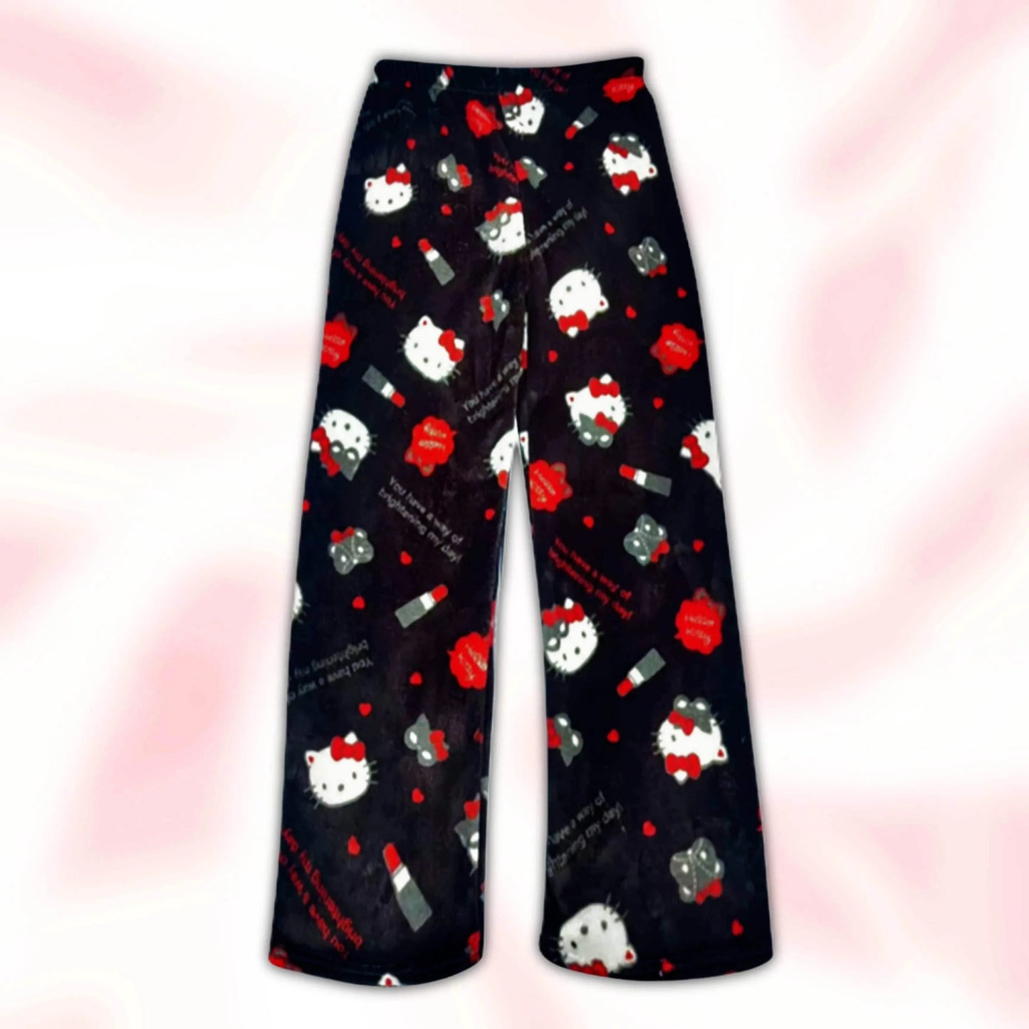 Black pajama pants with scattered Hello Kitty faces, red bows, and candy cane icons