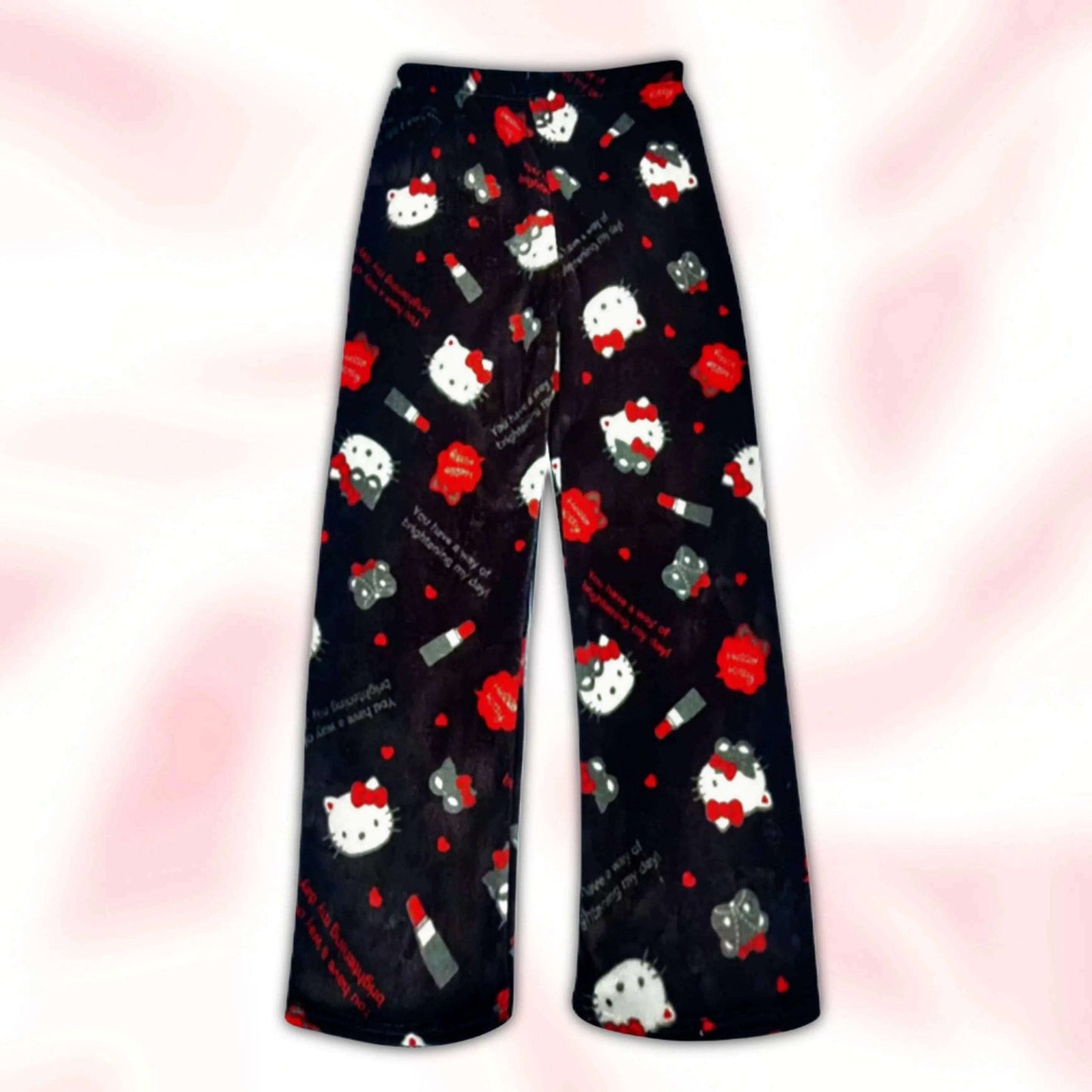 Black Hello Kitty pajama pants with red bows, candy cane, and character print.