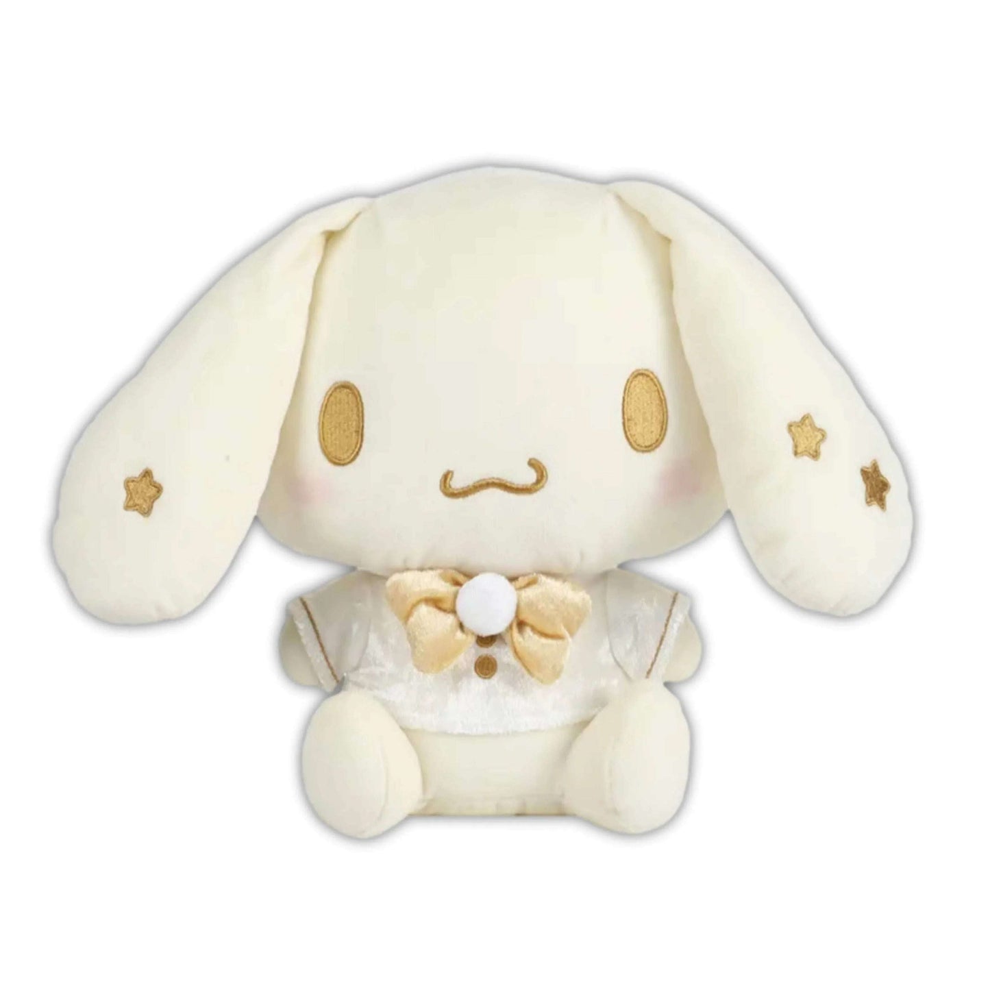 White bunny plush with gold star accents, curved smile face, and gold bow at the neck