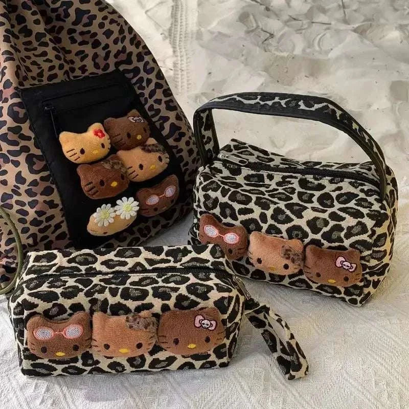 Leopard print Hello Kitty handbag with stitched plush character faces on the front