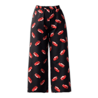Black thin pajama pants with repeating red car print