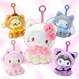 Multiple pastel plush cat keychains with metal chain rings, mixed colors on background.