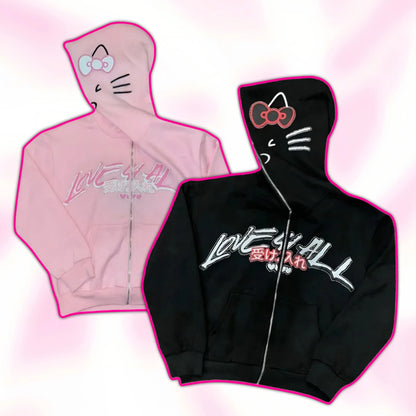 Pink and black Hello Kitty zip-up hoodie set with cat face hood and chest graphic.