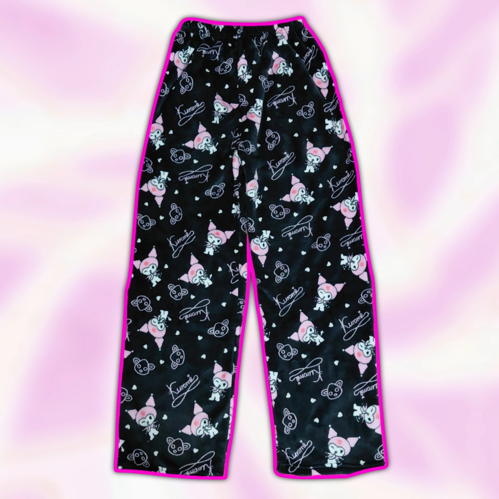 Black pajama pants with pink and white character print, wide straight fit