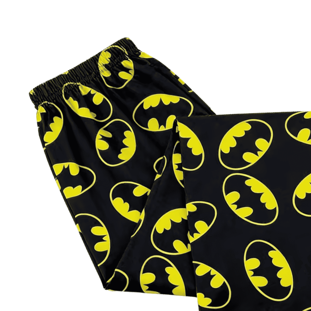 Thin Batman pajama pants, black with neon yellow bat face pattern