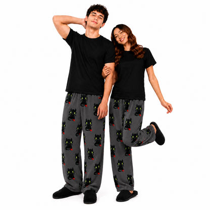 Dragon-themed matching pajama set: black tops and dark gray pants with dragon faces