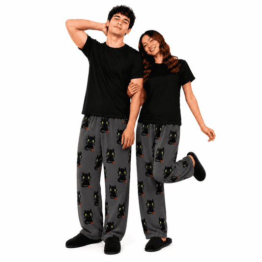Dragon-themed matching pajama set: black tops and dark gray pants with dragon faces