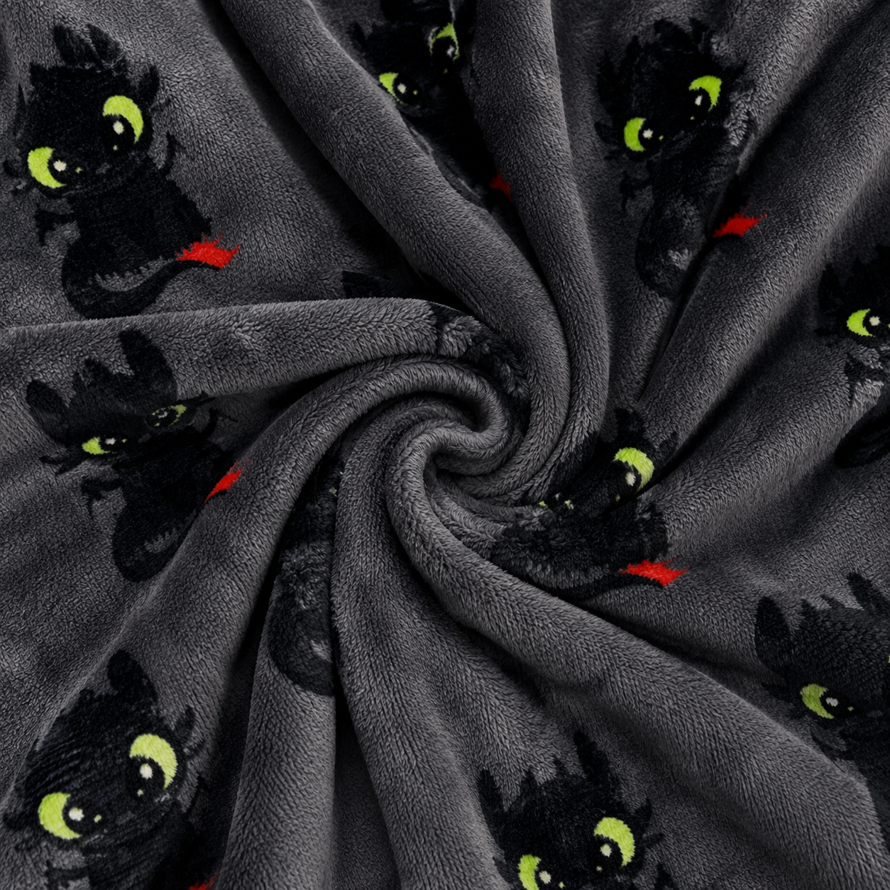 Dragon face pajama fabric in dark gray with green eyes and red details