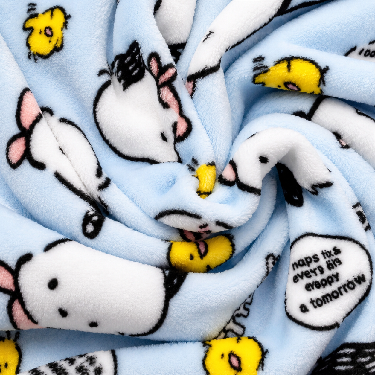 Light blue plush pajama pants with cartoon dog-face prints and elastic waistband
