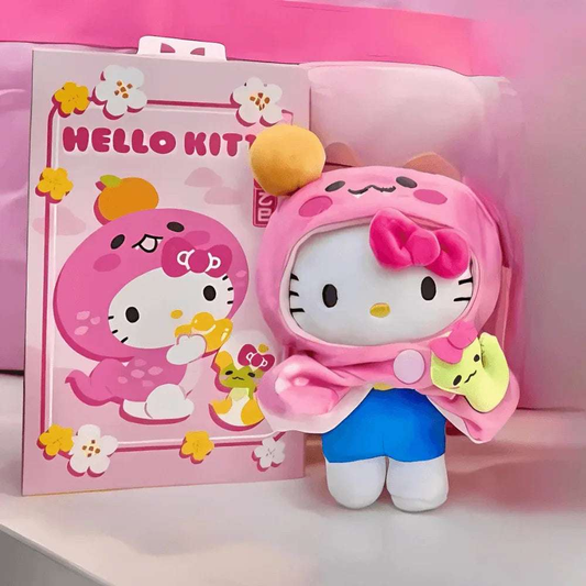 Hello Kitty year of the snake keychain plush with pink hood, blue skirt, and green snake charm