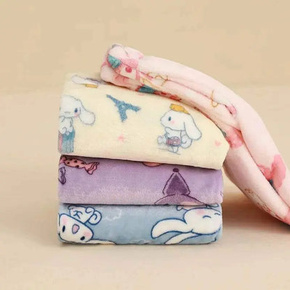Folded character pajama pants in lavender, light blue, and cream with cute animal prints