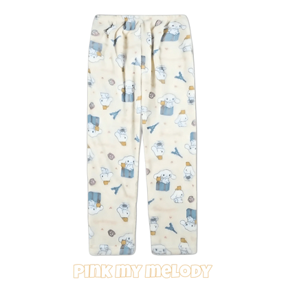 Pink character pajama pants with scattered cartoon figures and elastic gathered waistband