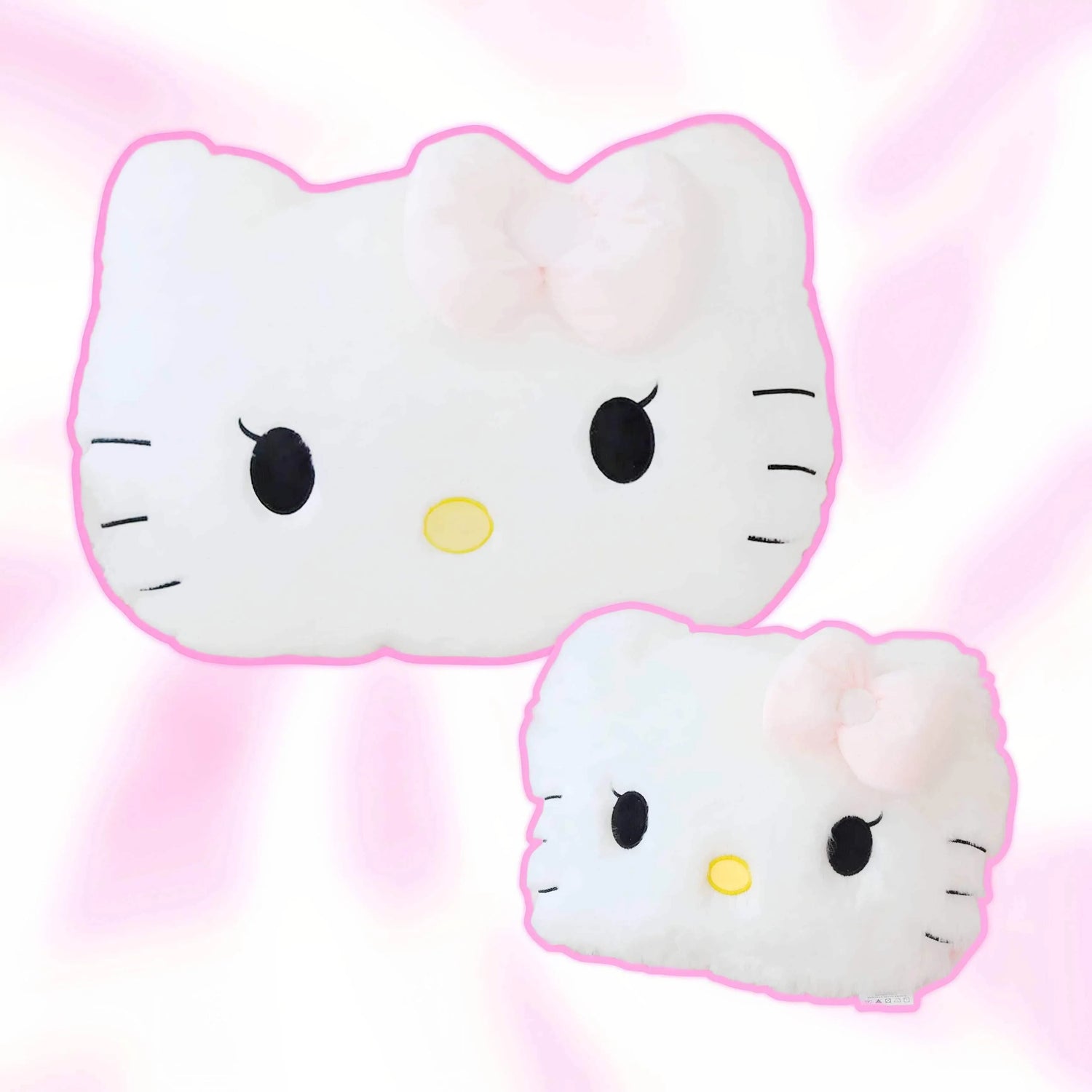 Hello Kitty cloud-shaped plush pillow, white with pink outline and bow
