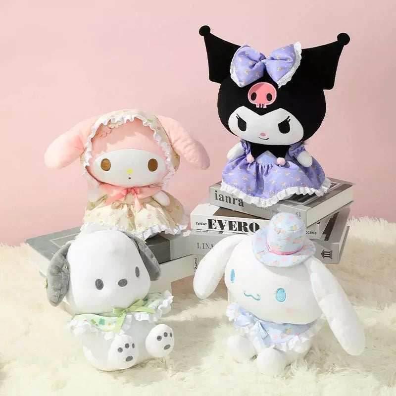 Mixed plush toys in pastel outfits with bow details, posed on a soft surface
