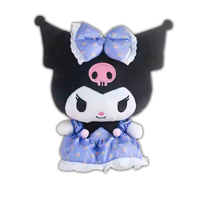 Black plush toy with large blue bow and blue dress with apron-like ruffle
