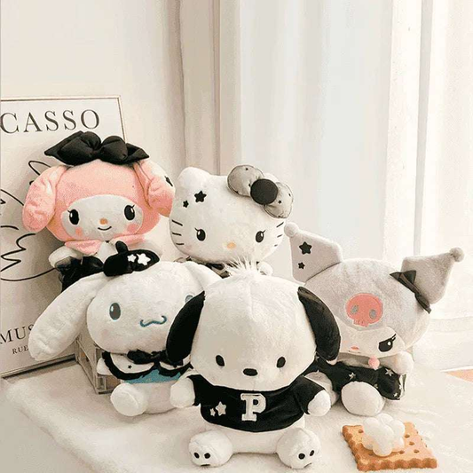 Group of plushies on a couch: white and pastel characters in black star outfits