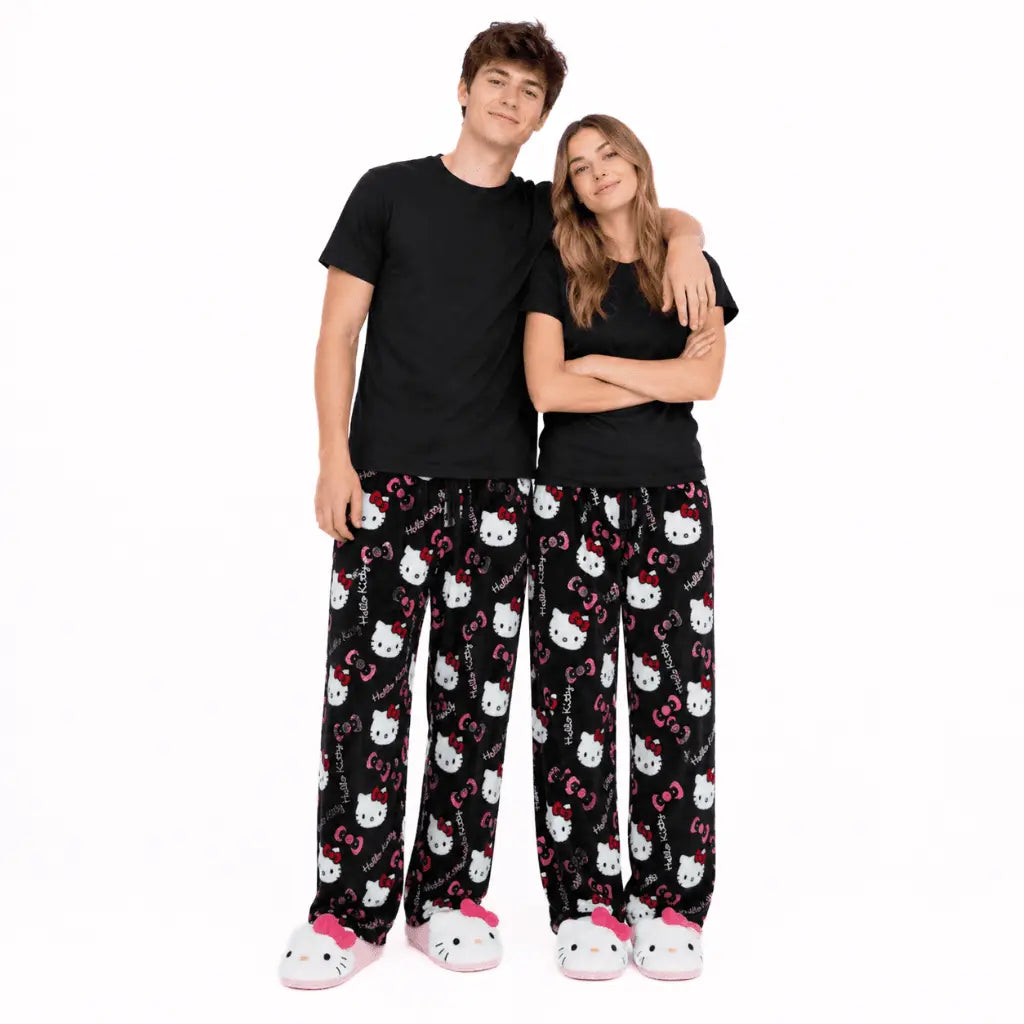 Black Hello Kitty pajama pants with allover character print and elastic waistband
