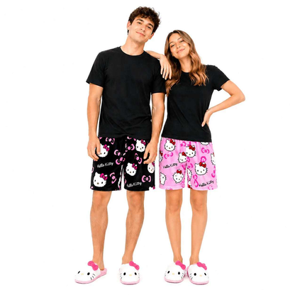 Hello Kitty pajama shorts on a couple, black and pink prints with bow details