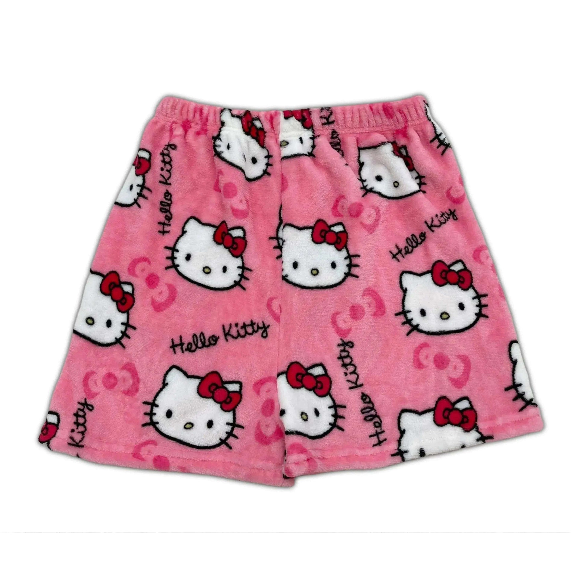 Pink pajama shorts with Hello Kitty cat faces and red bow details all over