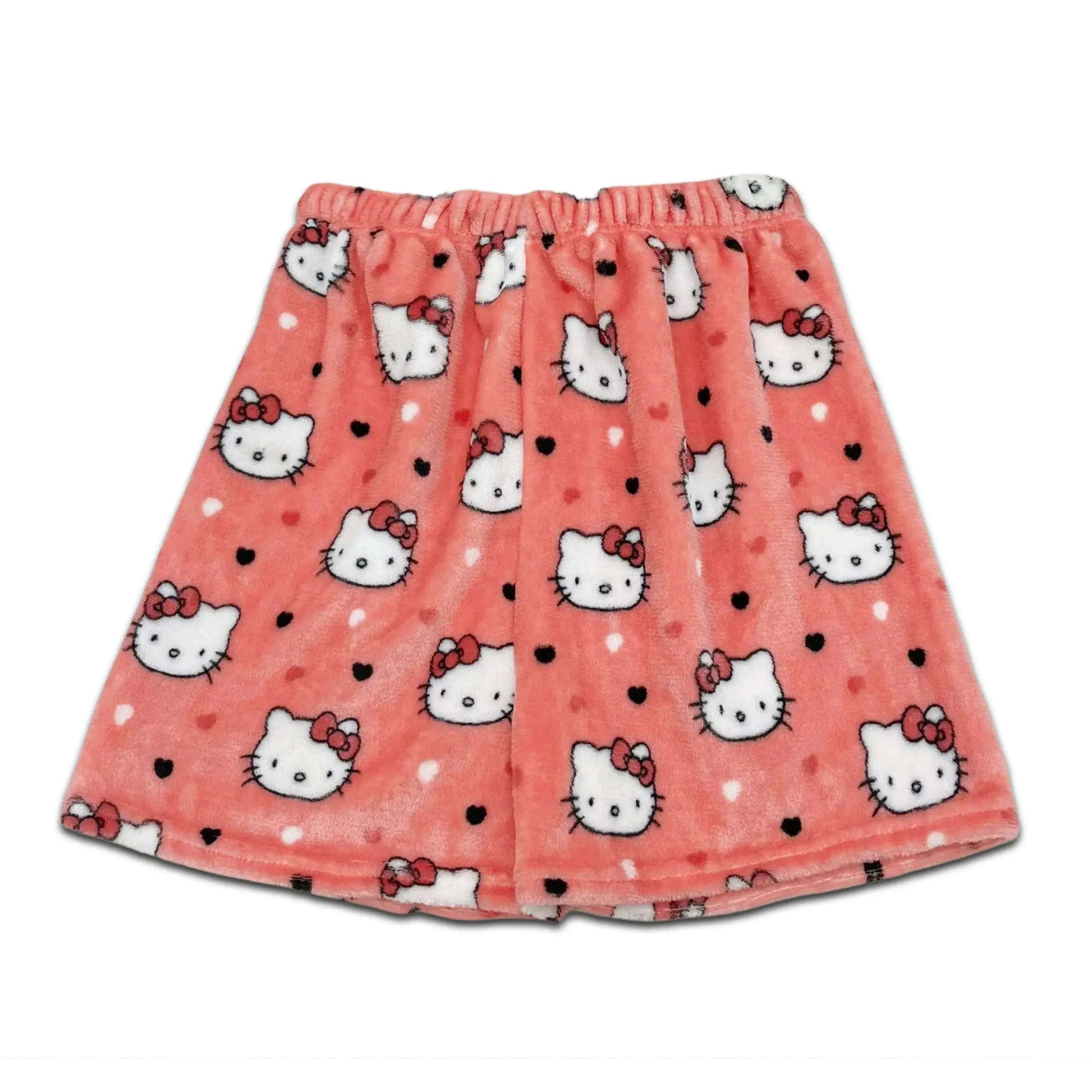 Coral pink pajama shorts with Hello Kitty faces and small black dot accents
