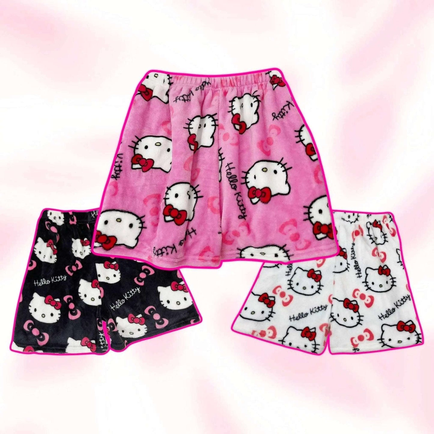 Assorted Hello Kitty pajama shorts in pink and dark styles, with cat-face prints