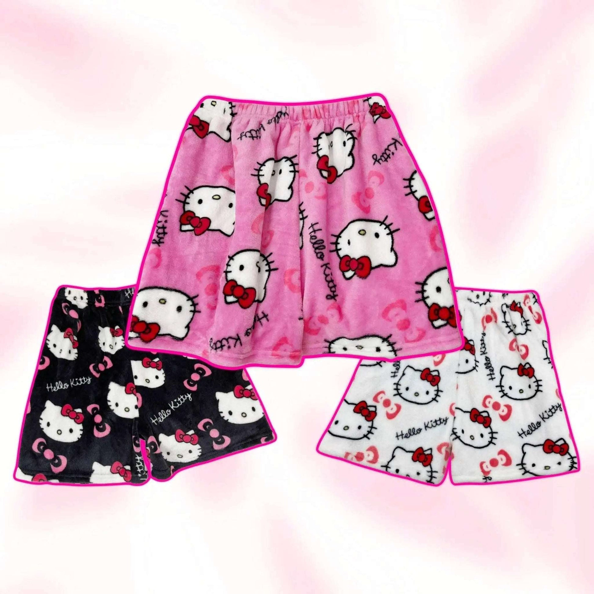 Assorted Hello Kitty pajama shorts in pink and dark styles, with cat-face prints