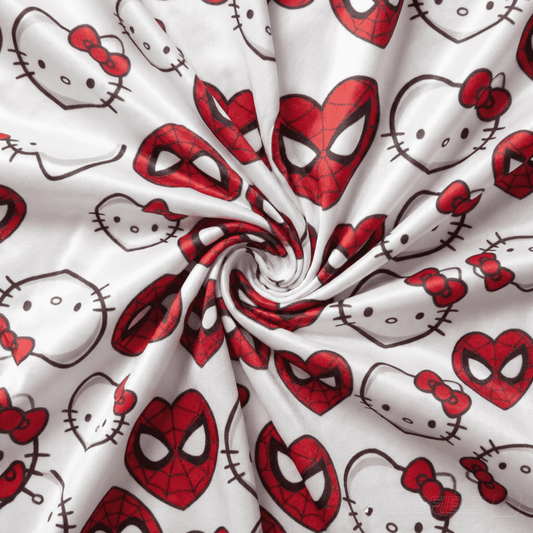 White pajama pants fabric with Hello Kitty and Spider-Man character print, knit cotton texture