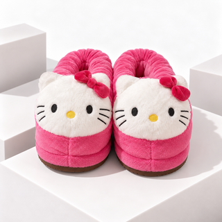 Pink Hello Kitty head slippers with plush white face and red bow trim
