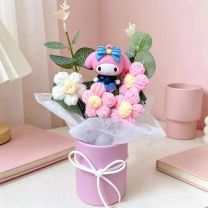 Plush flower arrangement with pink Hello Kitty plush and pink, white crocheted flowers