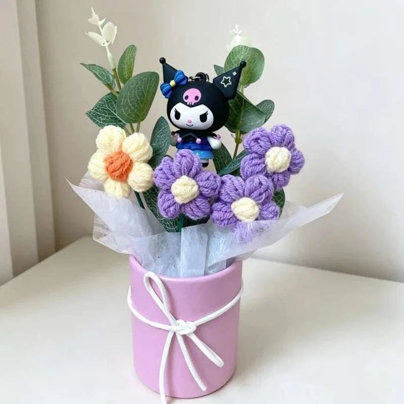 Plush flower arrangement with black-and-pink panda plush and purple crocheted flowers