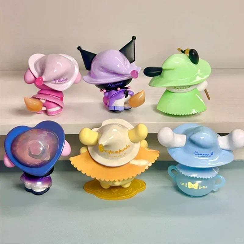 Six pastel character figurines, including a green hat figure and a blue whale figure.