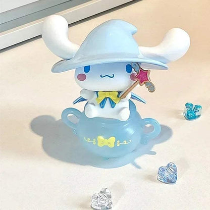Blue cat witch figurine with star wand, teacup, and heart accessory pieces