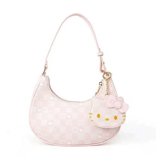 Hello Kitty shoulder bag in pale pink with Hello Kitty face charm and top zip