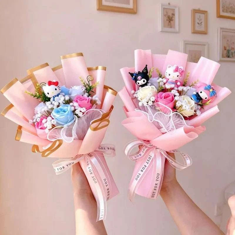 Two handheld plush character bouquets with artificial flowers, pink wrap and gold ribbons