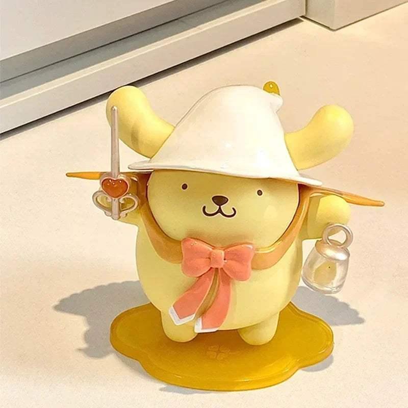 Cat wizard figurine, white hood with yellow horns, bow tie, wand and mug