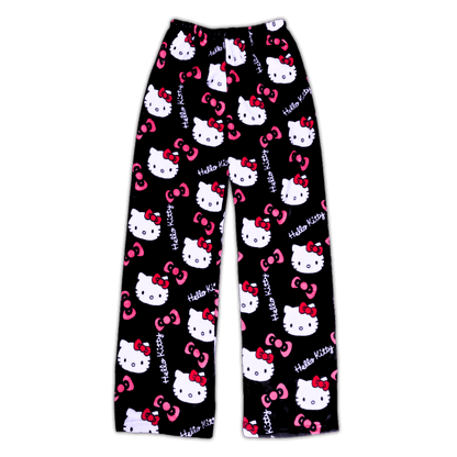 Hello Kitty pajama pants, black with pink bows and white character faces